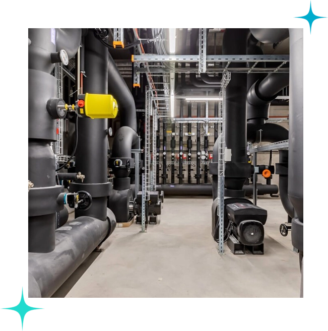 A large room with pipes and valves in it