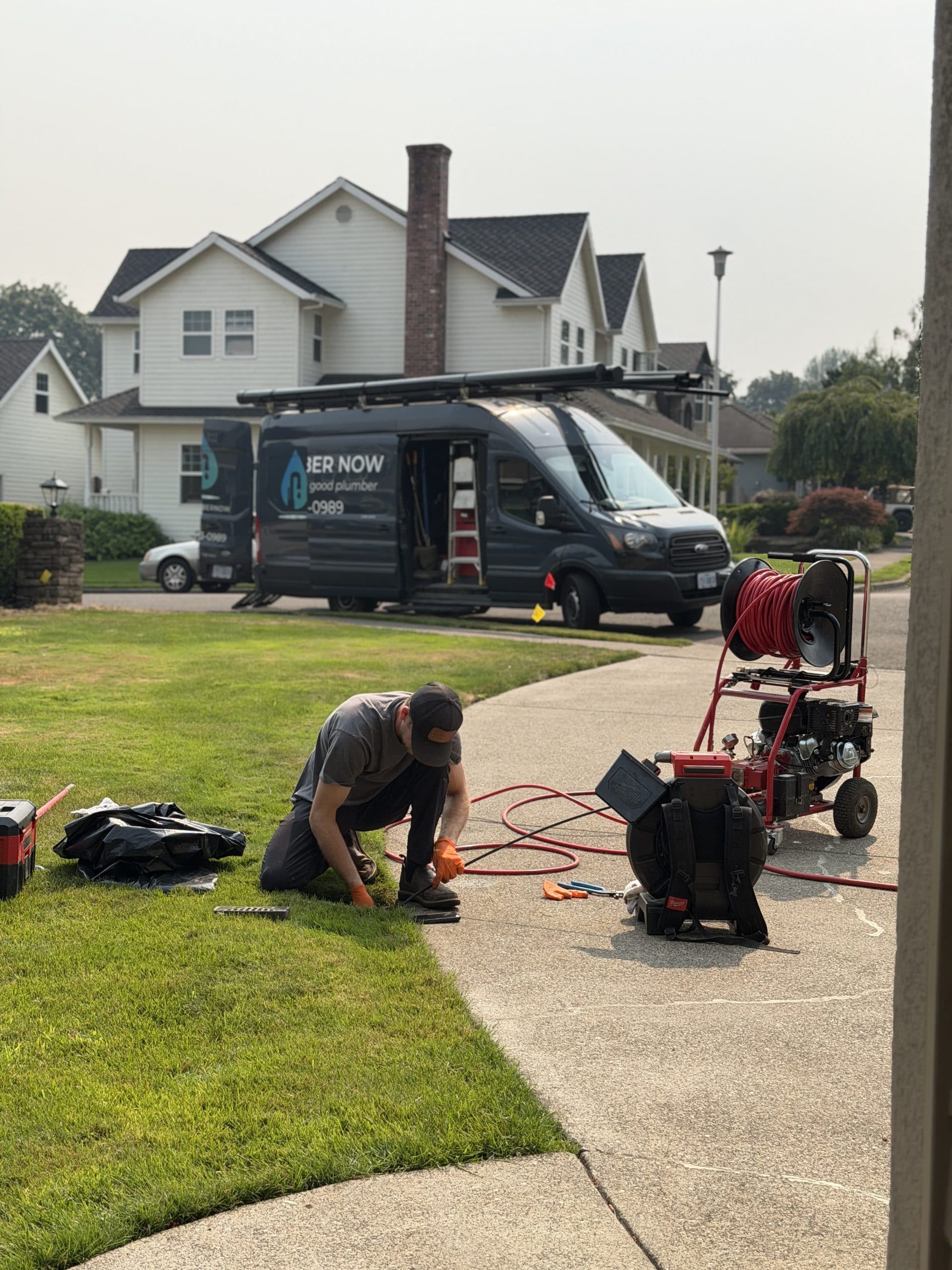 My Plumber Now technician servicing a water heater for a Newberg, OR customer