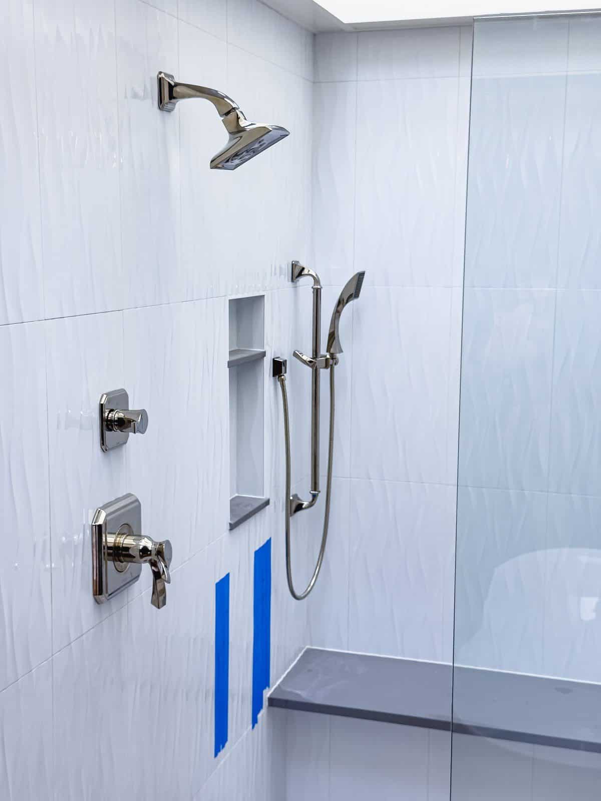 Finished shower with bench, niche and handheld, plumbed by MyPlumberNow in McMinnville, OR